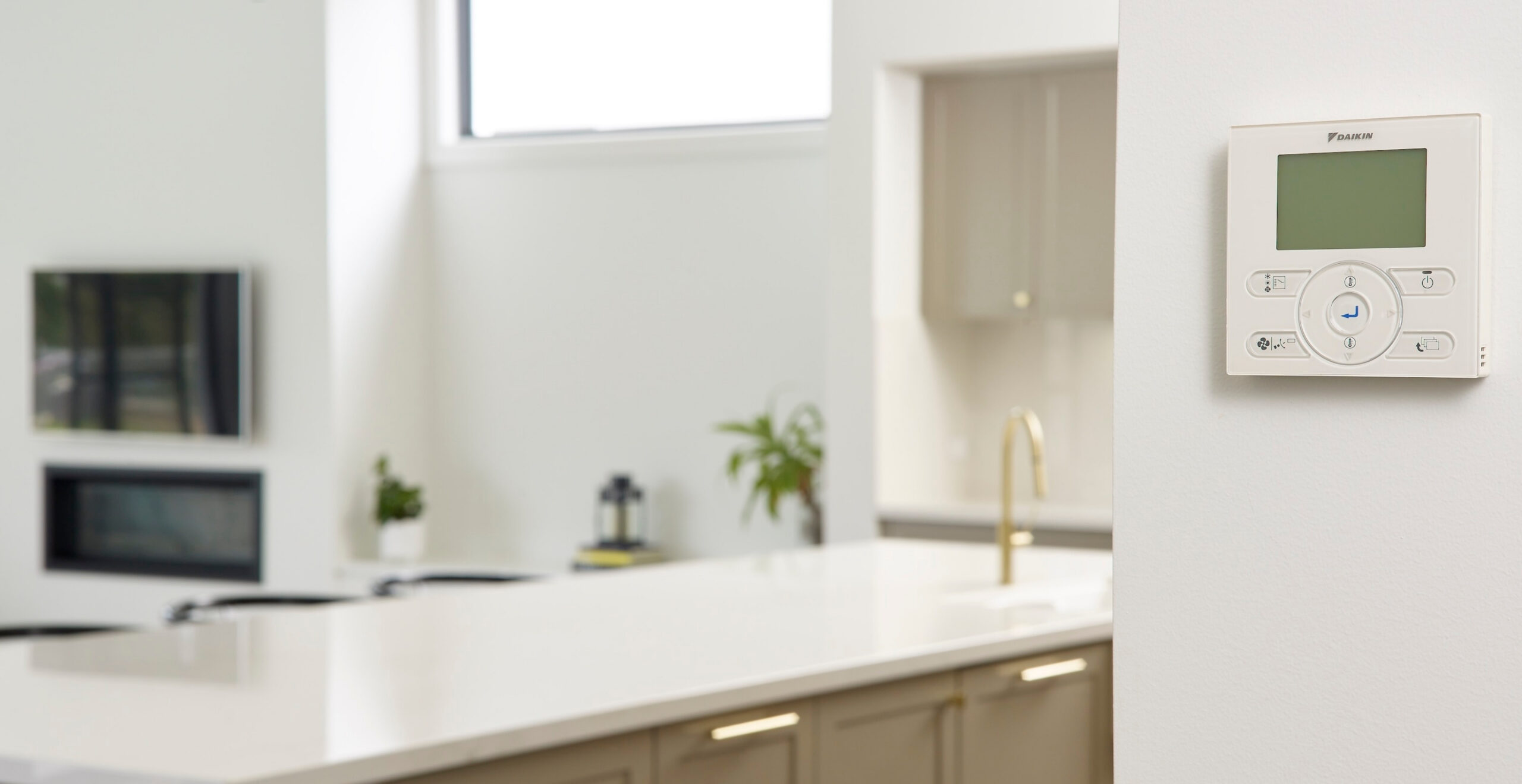 Daikin wall controller mounted on wall for air conditioning control on the Sunshine Coast, featuring intuitive temperature settings