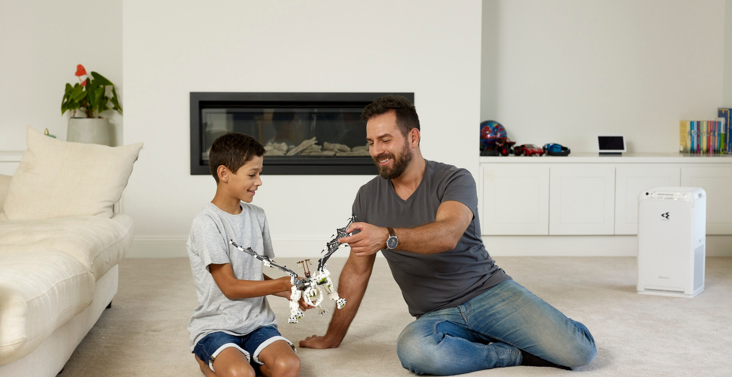 Family playtime in home with Daikin air purifier providing clean air on the Sunshine Coast