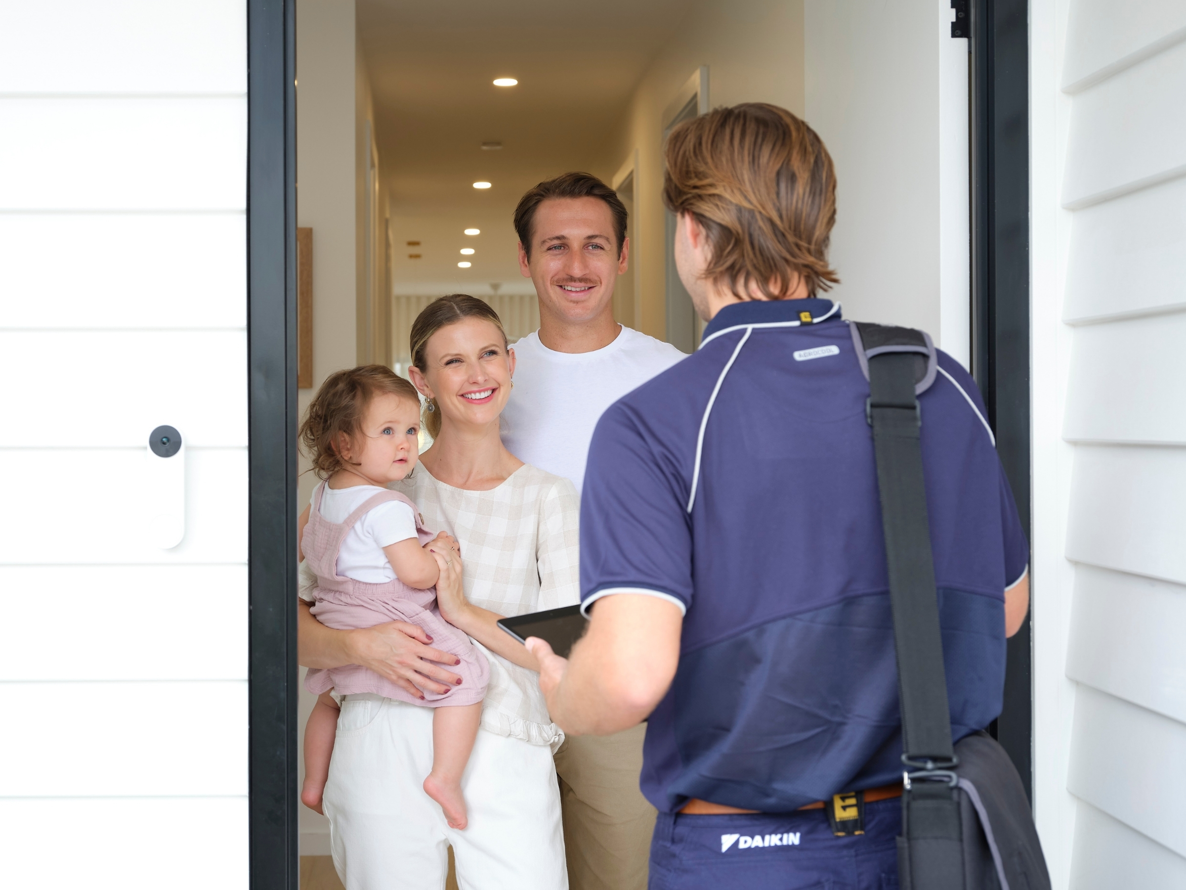 Professional Daikin technician arriving at Sunshine Coast home for air conditioning installation